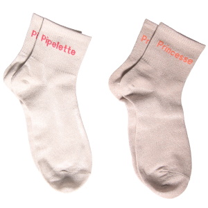 Paire de chaussettes en textile à paillettes avec le message Princesse ou Pipelette. 2 coloris différents. Vendu par paire. Votre préférence en commentaire.