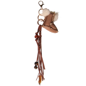 Porte-clés fantaisie composé de perles, de franges en suédine et d'une petite botte.
