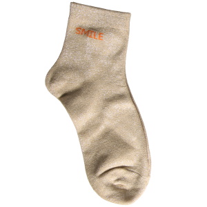 Paire de chaussettes scintillantes avec l'inscription Smile.