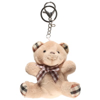 Porte clés avec un nounours en peluche en textile.