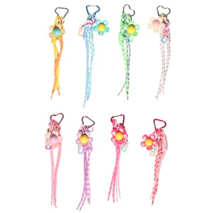 Porte-clés fantaisie avec deux cordons de couleur, d'une fleur de couleur, d'une chaîne en plastique de couleur et un mousqueton en forme de cœur. 8 coloris différents. Vendu à l'unité. Votre préférence en commentaire.