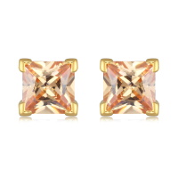 Boucles d'oreilles puces en plaqué or jaune 18 carats serties 4 griffes d'un oxyde de zirconium de couleur champagne de forme carré.