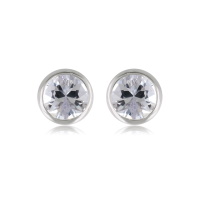 Boucles d'oreilles puces en argent 925/000 rhodié serties clos d'un oxyde de zirconium blanc.