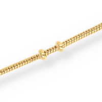 Bracelet chaîne maille serpent avec boules en plaqué or jaune 18 carats.