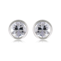 Boucles d'oreilles puces en argent 925/000 rhodié serties clos d'un oxyde de zirconium blanc.