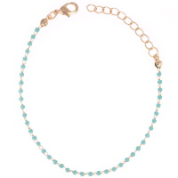 Bracelet en plaqué or jaune 18 carats et de perles tubes de couleur bleue turquoise. Fermoir mousqueton avec 3 cm de rallonge.