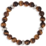 Bracelet boules élastique en acier argenté et perles en œil de Tigre. L'œil de tigre est une variété de quartz. Parfaite pour se concentrer et se recharger d'énergie, l'œil de tigre apporte chaleur et sécurité.