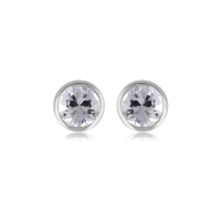 Boucles d'oreilles puces en argent 925/000 rhodié serties clos d'un oxyde de zirconium blanc.