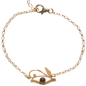 Bracelet composé d'une chaîne et d'un œil oudjat (ou d'Horus)en véritable bronze surmonté d'un cabochon violet. Fermoir mousqueton avec 2.5 cm de rallonge.