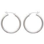 Boucles d'oreilles créoles en argent 925/000. Fil rond.