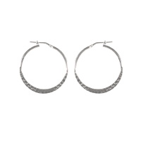 Boucles d'oreilles créoles martelée en argent 925/000.