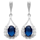 Boucles d'oreilles en argent 925/000 rhodié serties d'oxydes de zirconium blancs et d'une pierre synthétique bleue. Ovale  Adolescent Adulte Femme Fille Indémodable 