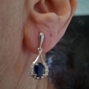 Boucles d'oreilles en argent 925/000 rhodié serties d'oxydes de zirconium blancs et d'une pierre synthétique bleue. Ovale  Adolescent Adulte Femme Fille Indémodable 