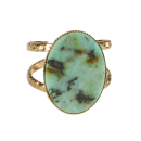 Bague de forme ovale en acier doré surmontée d'une véritable pierre de turquoise d'Afrique.<br/>Taille ajustable. Ovale  Adolescent Adulte Femme Fille Indémodable 