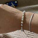 Bracelet composé d'une chaîne boules en plaqué or jaune 18 carats et perles d'imitation.<br/>Fermoir mousqueton avec 2 cm de rallonge. Boule Perle  Adolescent Adulte Femme Fille Indémodable 